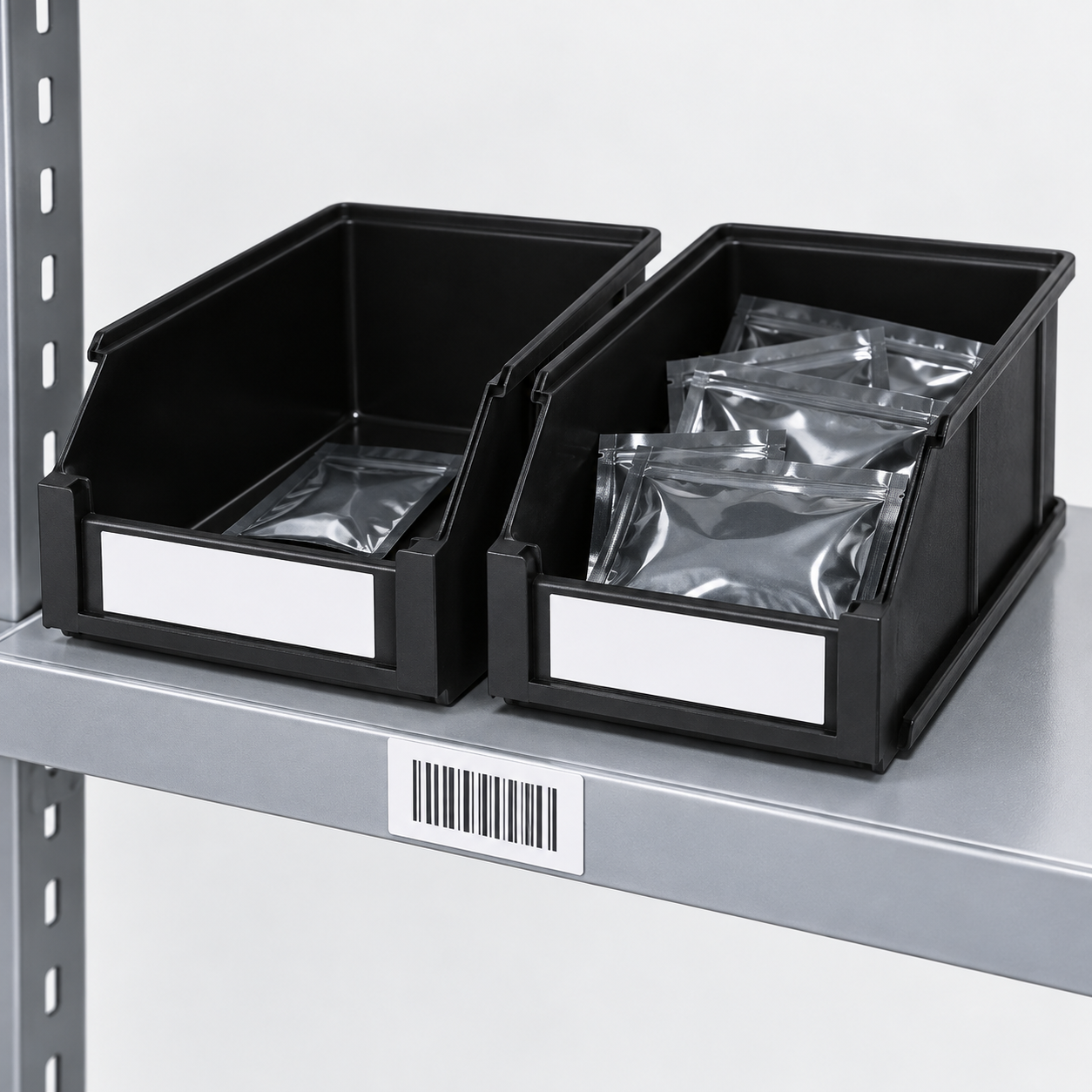 Two black front-opening ESD bins with sealed pouches at different fill levels