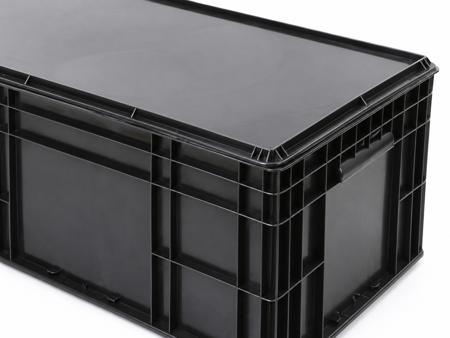 Close view of a black ESD tote lid fitted to its ribbed side walls
