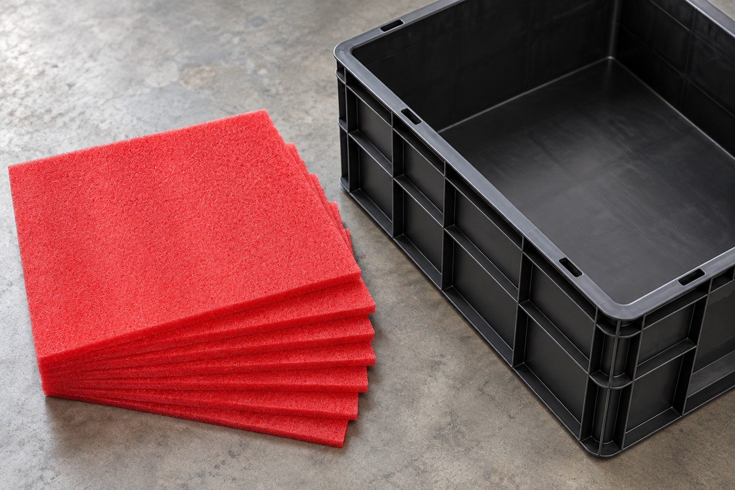 Foam surface and sheet edge beside an empty tote